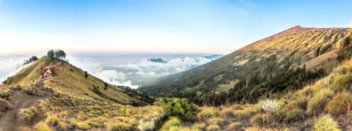 Lombok, Panorama mountain view above the cloud and blue sky. Rinjani mountain, Lombok island, Indonesia