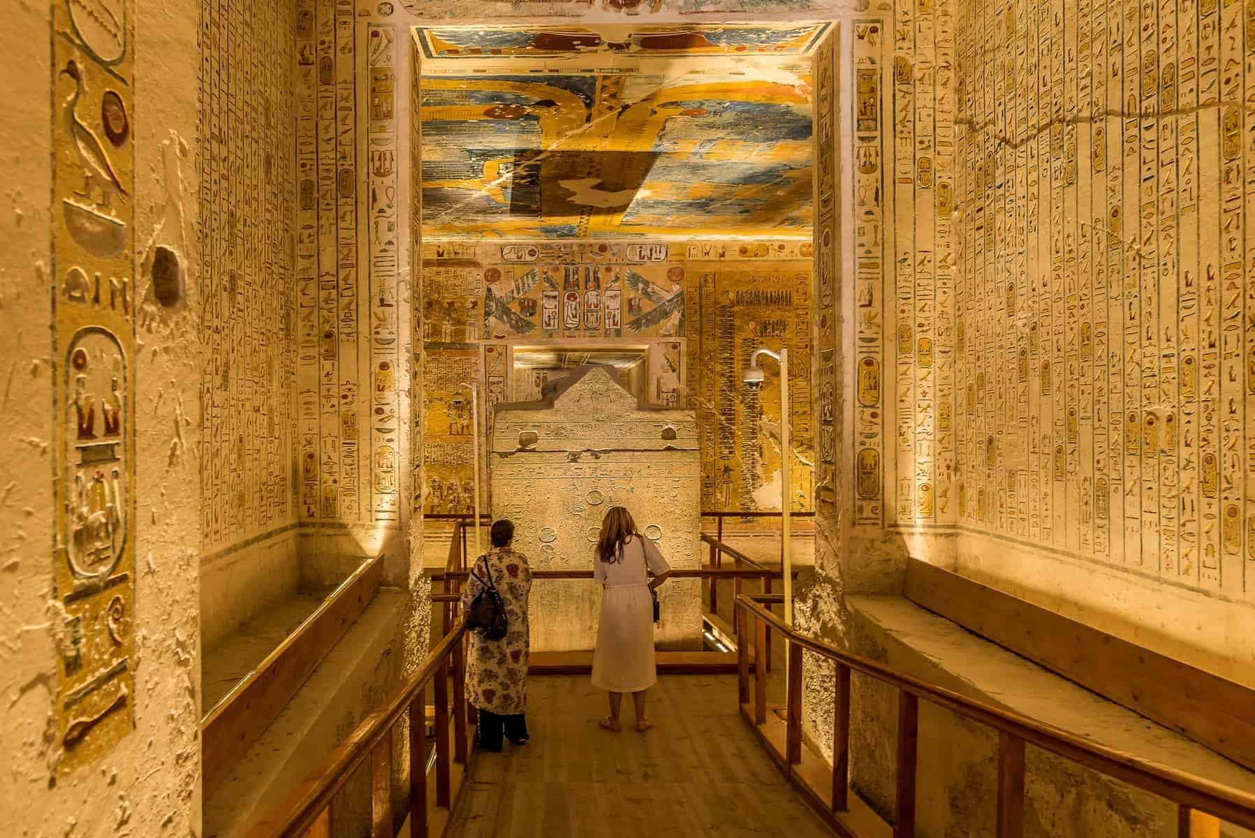 Two turists in the interior of the tomb KV 2 Ramses IV in the valley of the kings, Luxor, Egypt, October 21, 2018