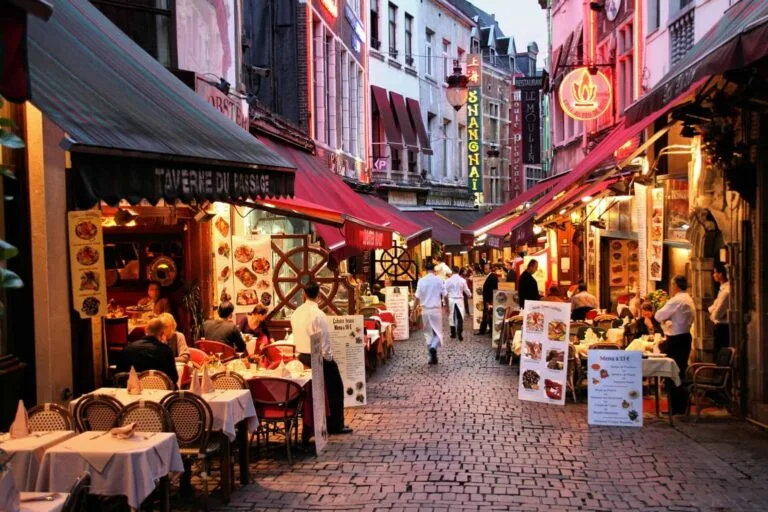 BRUSSELS - SEPTEMBER 1: Evening view of restaurants on September 1, 2009 in Brussels, Belgium. Rue des Bouchers street is famous for its numerous restaurants offering cuisine from any place in the world. Photo