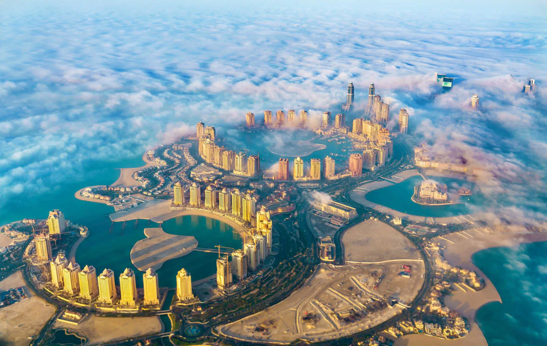Aerial view of the Pearl-Qatar island in Doha through the morning fog