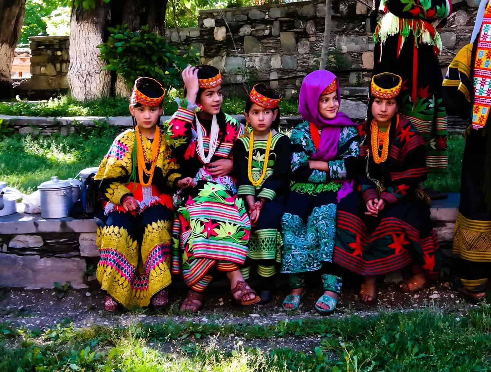 Portrait of Kalash tribe woman in national costume at Joshi fest - 14-05-2015 Bumburet, Kunar, Pakistan