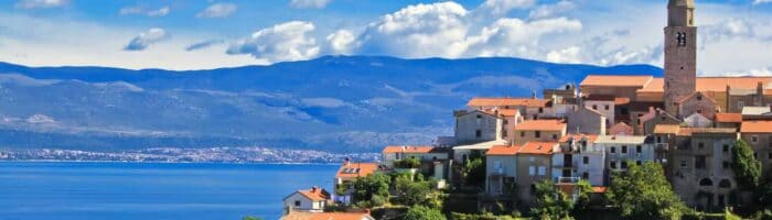 Kvarner. Adriatic Town of Vrbnik in front of blue sea, Island of Krk, Croatia