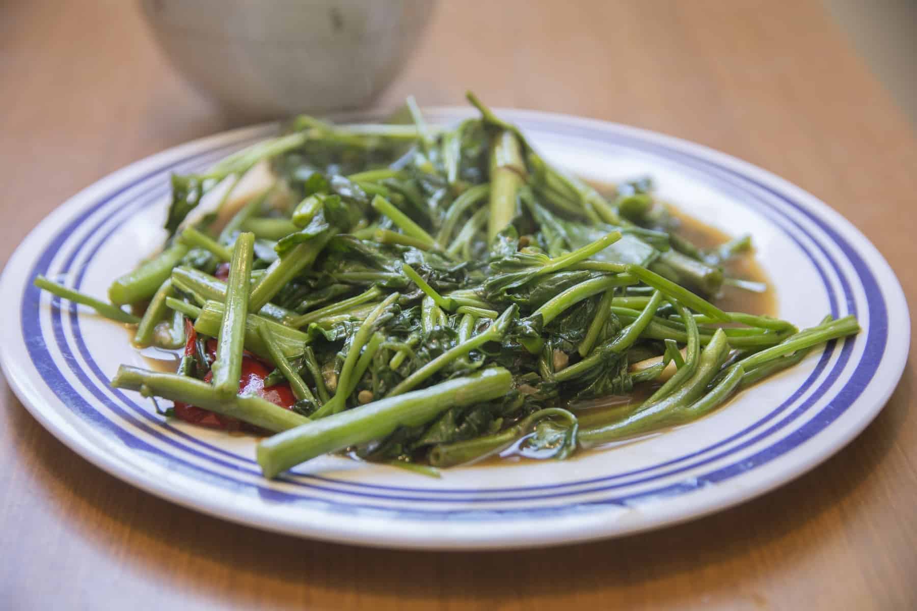 Pad Pak Boong, a traditional Thai dish, stir fried