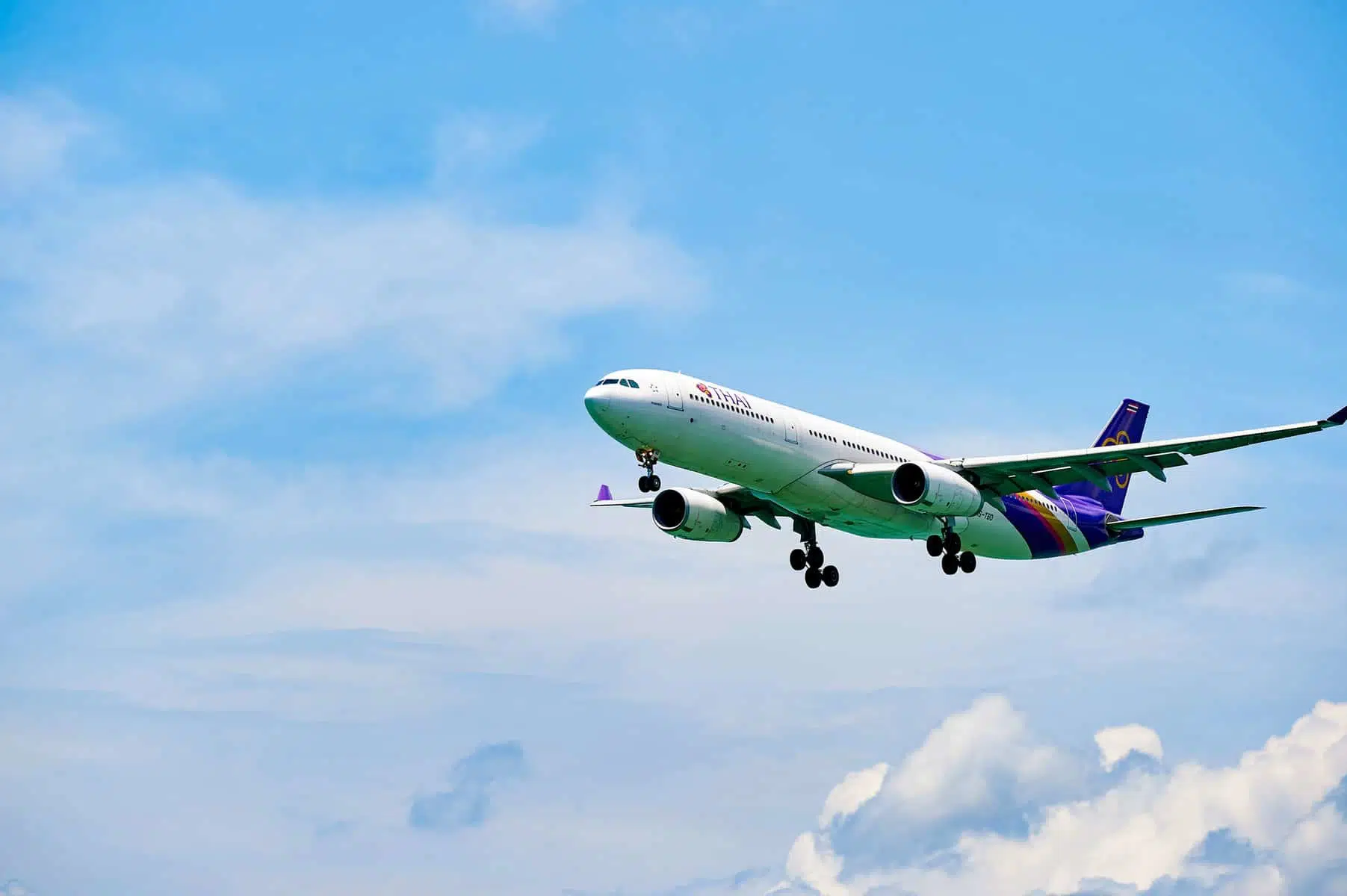 THAI aircraft landing at Hong Kong airport. Thai Airways International Public Company Limited, also trading as THAI is the flag carrier airline of Thailand
