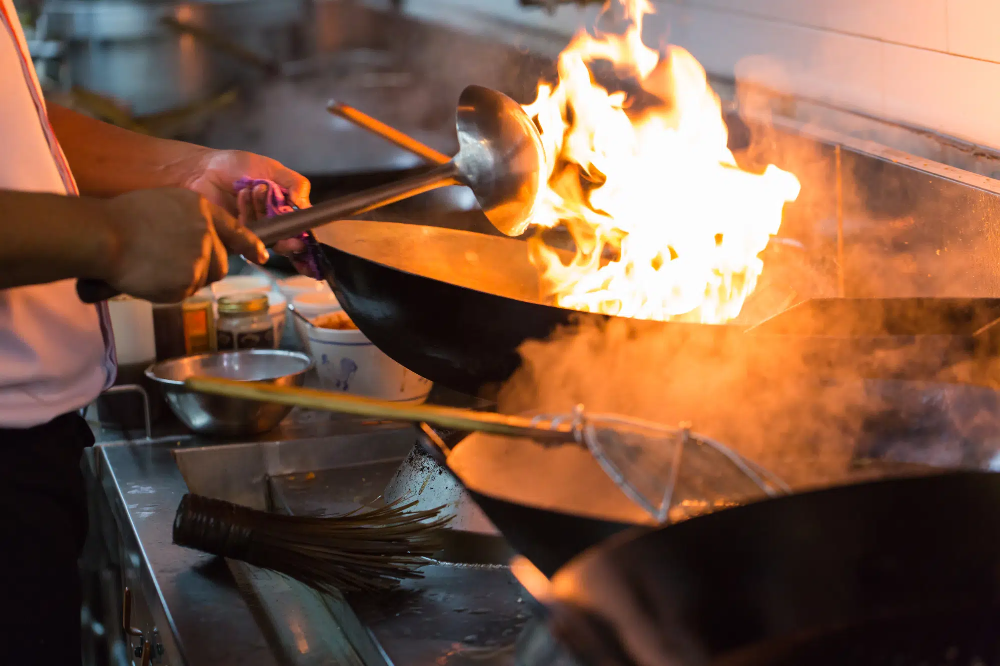 Motion fire burn is cooking on iron pan, stir fire very hot