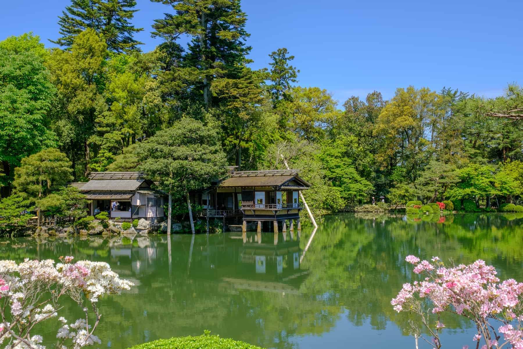 Pond and tea house in Kenrokuen, a japanese garden in Kanazawa, Ishikawa prefecture, Japan