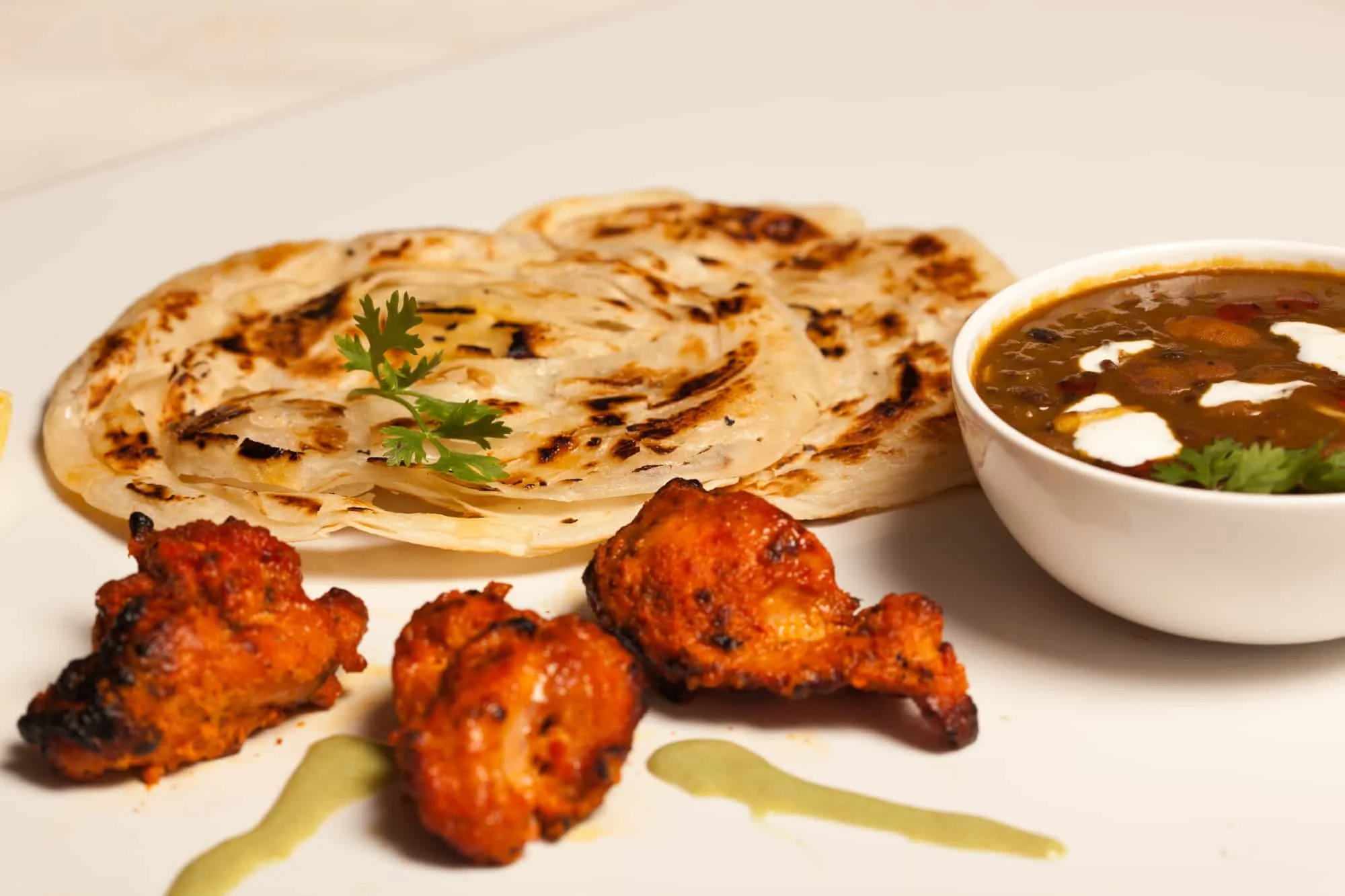 Paratha with paneer masala and chicken kebab.