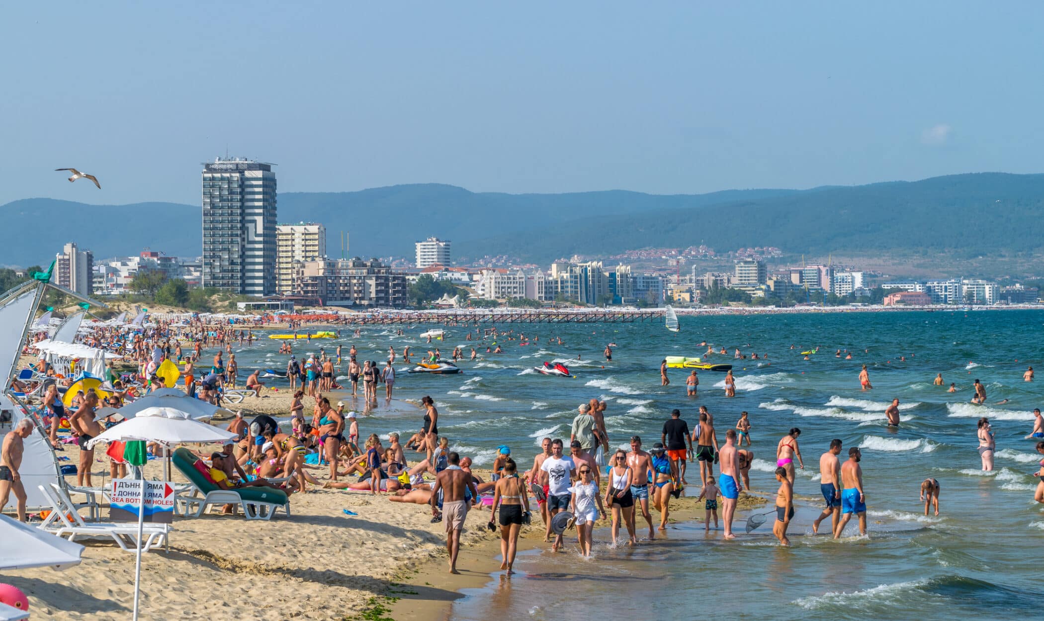 People in the sea at Sunny Beach resort, where the party is at