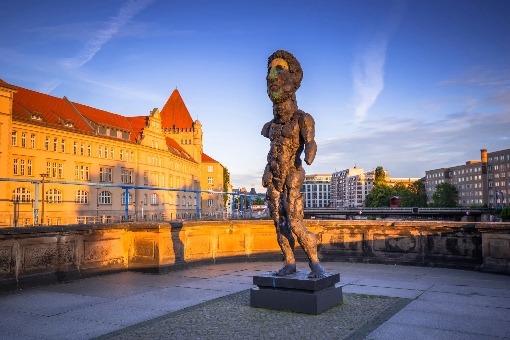 Art statue on museum island in Berlin at sunrise, Germany. Berlin is the capital and the largest city of Germany with a population of approximately 3.7 million people.