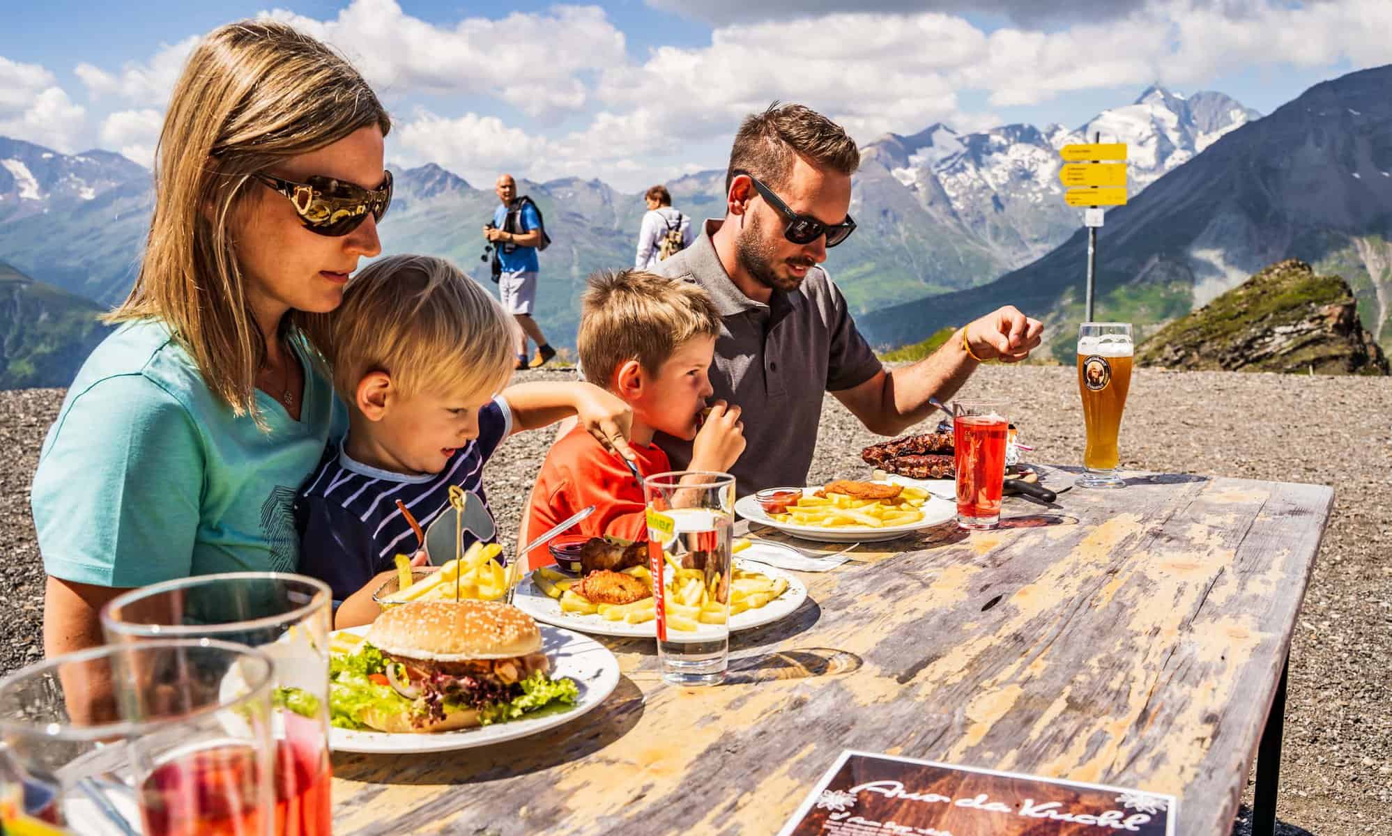 family eating on a holiday in Austria